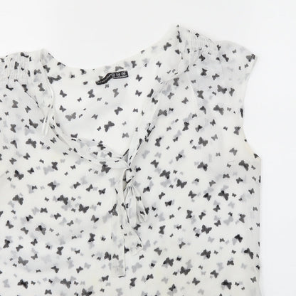 Close-up detail of Atmosphere women’s white basic blouse, size UK 12