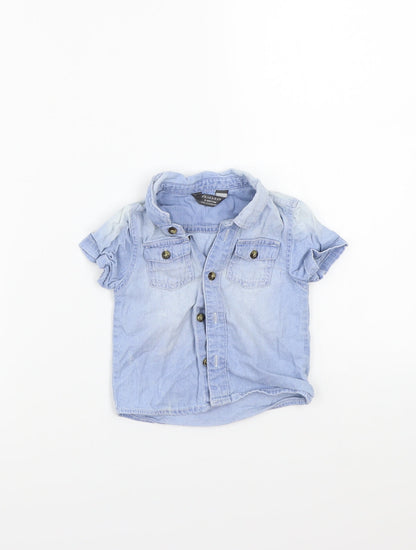 Front view of Primark girls’ blue basic button-up, size 6-9, months
