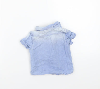 Back view of Primark girls’ blue basic button-up, size 6-9, months