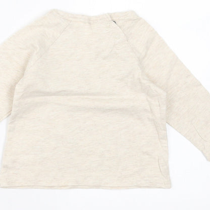 Brand and care label for H&M girls’ beige basic t-shirt, size 3-6, months - mickey mouse
