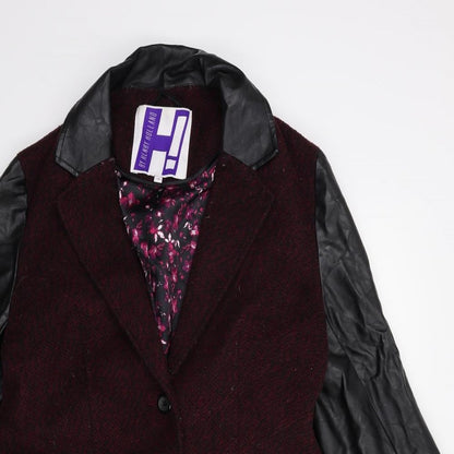 Close-up detail of By Henry Holland women’s red overcoat coat, size UK 14