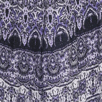 Close-up detail of Papaya women’s purple geometric sweatpants, size UK 34, in, 29-inch leg