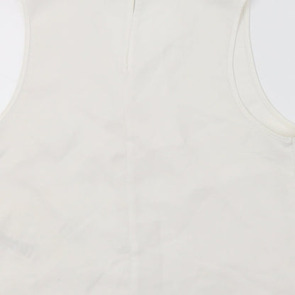 Brand and care label for ASOS women’s white basic blouse, size UK 8
