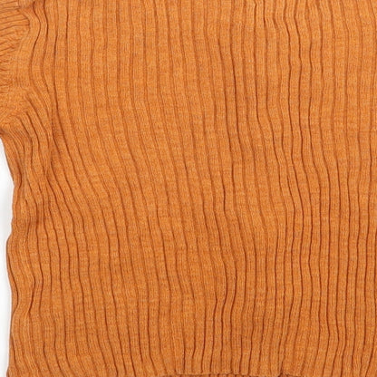 Brand and care label for Next girls’ brown basic blouse, size 9, years