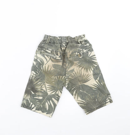 Back view of TU boys’ green floral denim bermuda shorts, size 5, years