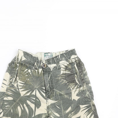 Close-up detail of TU boys’ green floral denim bermuda shorts, size 5, years