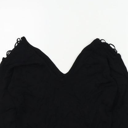Close-up detail of evie women’s black jumper, size UK 14, - open shoulders