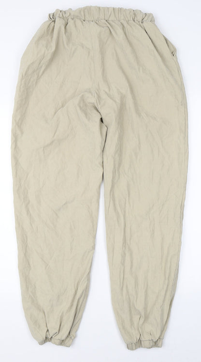 Back view of Missguided women’s beige trousers, size UK 8, 30-inch leg