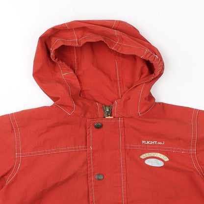 Close-up detail of Baby Club Baby Red Jacket, size 12, Months