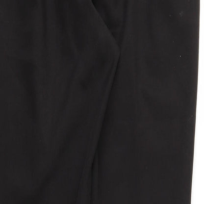 Brand and care label for CANDA women’s black trousers, size UK 12, - stretch waistband