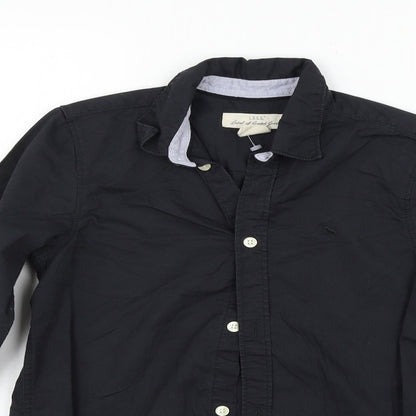 Close-up detail of LOGG girls’ black basic button-up, size 10-11, years