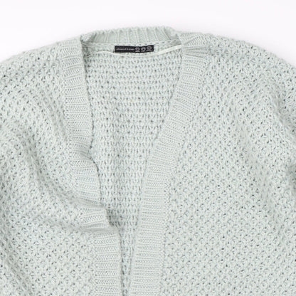 Close-up detail of Atmosphere women’s green knit cape jumper, size UK 12