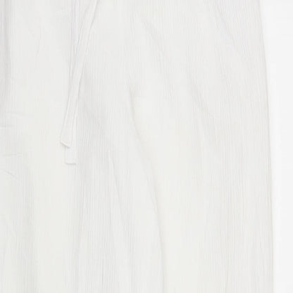 Close-up detail of Canda women’s white bloomer trousers, size UK 12, 29-inch leg