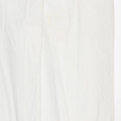 Brand and care label for Canda women’s white bloomer trousers, size UK 12, 29-inch leg