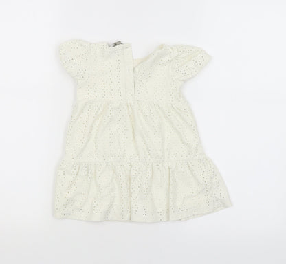 Back view of Primark girls’ yellow shift, size 9-12, months