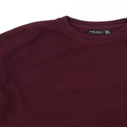 Close-up detail of bershak girls’ red colourblock jumper, size S
