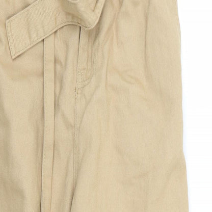 Close-up detail of denim and co women’s beige trousers, size UK 8, 25-inch leg