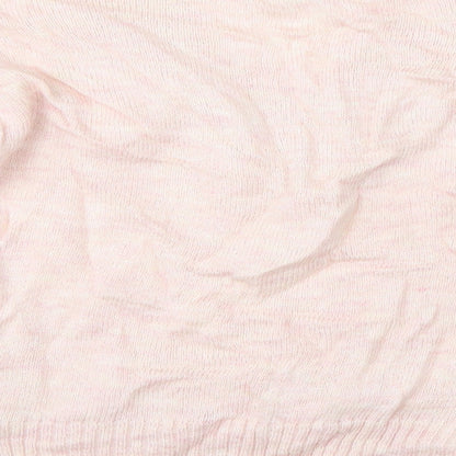 Brand and care label for Miss Selfridge women’s pink jumper, size UK 6