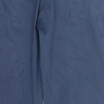 Brand and care label for Denim & Co. men’s blue trousers, size 36, 31-inch leg