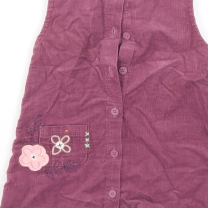 Brand and care label for Debenhams girls’ purple floral fit & flare, size 3-6, months
