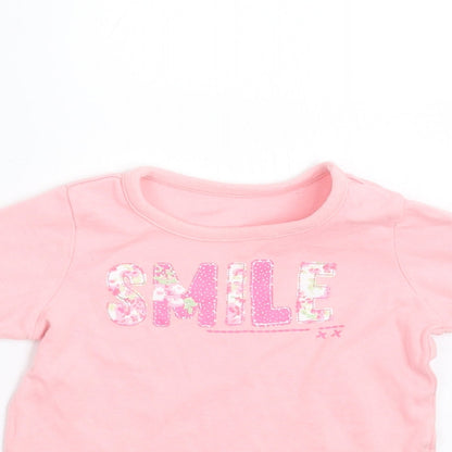 Close-up detail of Dylan George girls’ pink basic t-shirt, size 6-9, months - smile