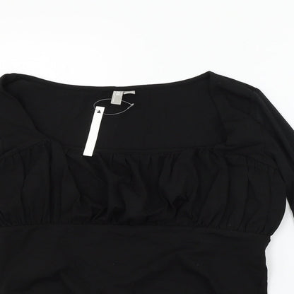 Close-up detail of ASOS women’s black basic t-shirt, size UK 14