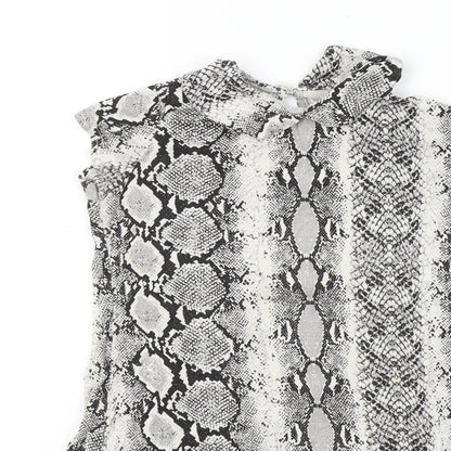 Close-up detail of Boohoo girls’ black animal print basic t-shirt, size 5-6, years