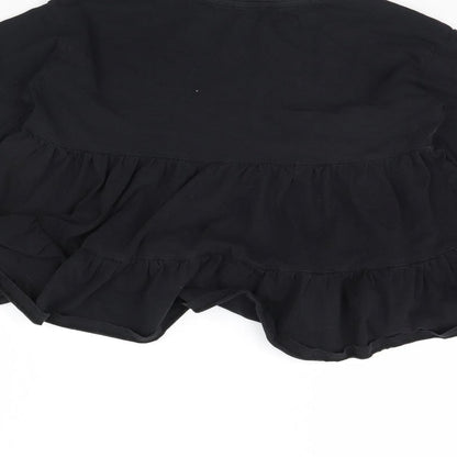Brand and care label for Primark girls’ black basic blouse, size 11-12, years