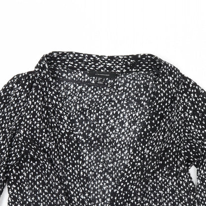Close-up detail of Atmosphere women’s black polka dot jacket, size UK 12