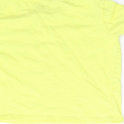 Brand and care label for Primark girls’ yellow basic t-shirt, size 4-5, years