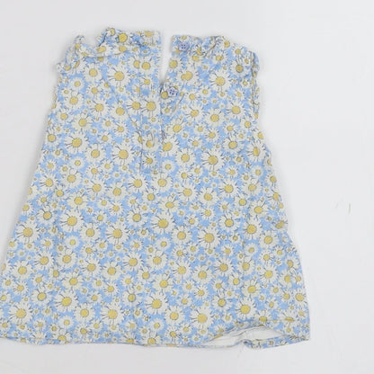 Brand and care label for Tu Baby White A-Line, size 6-9, Months