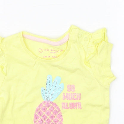 Close-up detail of Primark girls’ yellow basic t-shirt, size 3-6, months