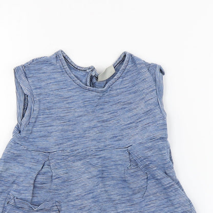 Close-up detail of girls’ blue pullover t-shirt, size 2-3, years