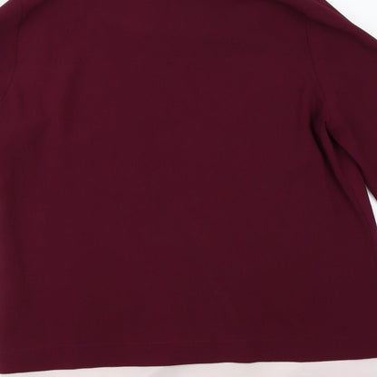 Brand and care label for Atmosphere women’s purple basic blouse, size UK 10