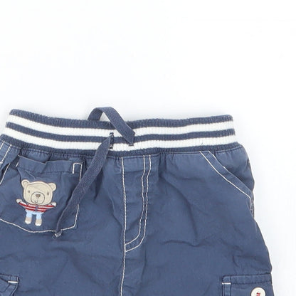 Close-up detail of Tu boys’ blue cropped trousers, size 9-12, months