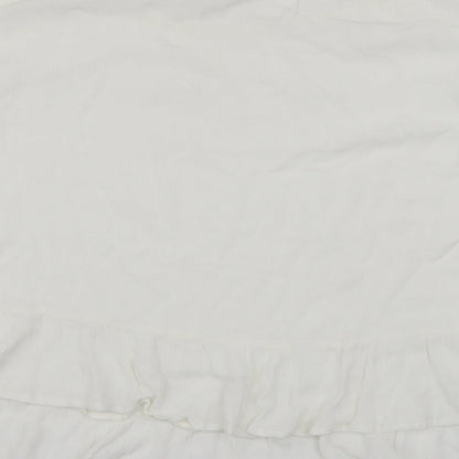 Brand and care label for Papaya women’s white basic blouse, size L