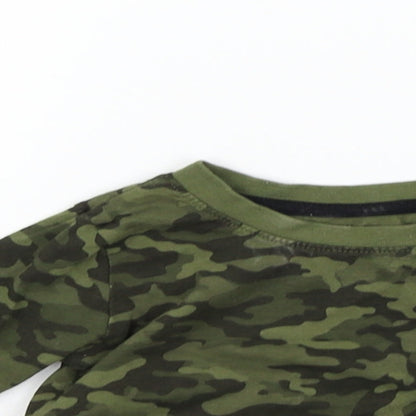 Close-up detail of Primark girls’ green geometric basic t-shirt, size 12-18, months