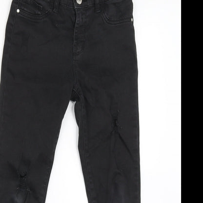 Close-up detail of Denim & Co. girls’ black denim skinny jeans, size 8-9, years