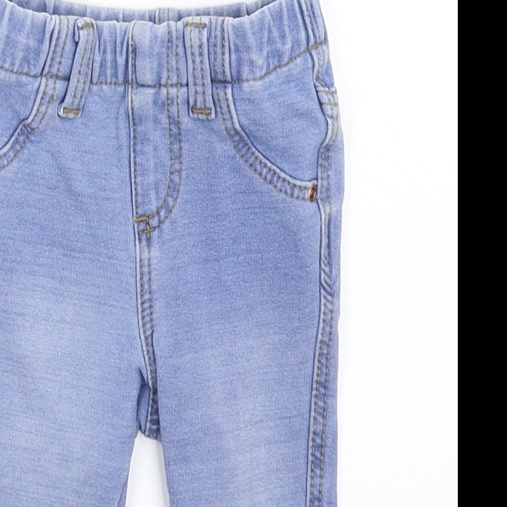 Close-up detail of Denim & Co. girls’ blue denim capri jeans, size 6-9, months