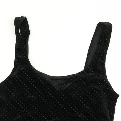 Close-up detail of Miss Selfridge women’s black polka dot basic tank, size UK 8, - crop top