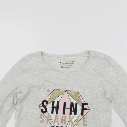 Close-up detail of Primark girls’ grey basic t-shirt, size 9-10, years