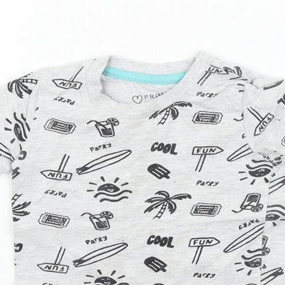 Close-up detail of Primark girls’ grey geometric basic t-shirt, size 12-18, months