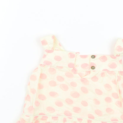Close-up detail of F&F girls’ beige geometric a-line, size 12-18, months