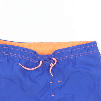 Close-up detail of Rebel boys’ blue bermuda shorts, size 4-5, years
