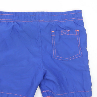Brand and care label for Rebel boys’ blue bermuda shorts, size 4-5, years