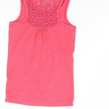 Brand and care label for George girls’ pink basic tank, size 7, years