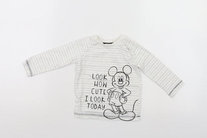 Front view of Disney girls’ white jumper, size 6-9, months