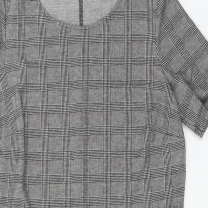 Close-up detail of Papaya women’s grey check a-line, size UK 14