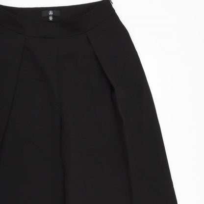 Close-up detail of Missguided women’s black trousers, size UK 12, 22-inch leg
