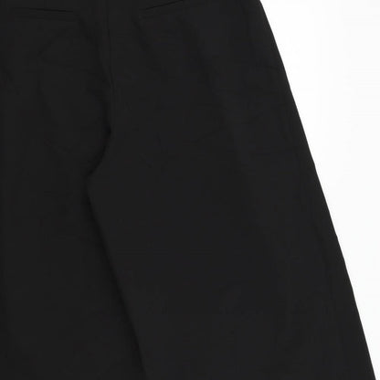 Brand and care label for Missguided women’s black trousers, size UK 12, 22-inch leg
